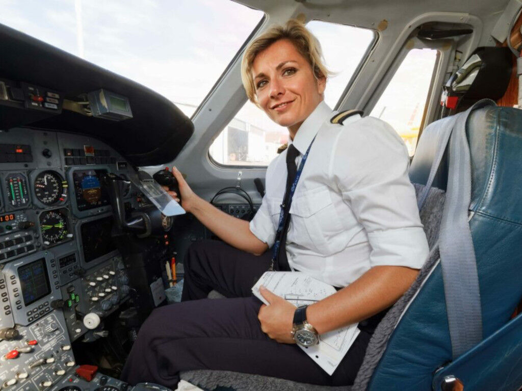 woman pilot in cockpit