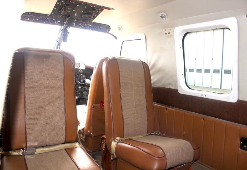 1959 Aero Commander 500A N711NE cabin interior rear view towards cockpit